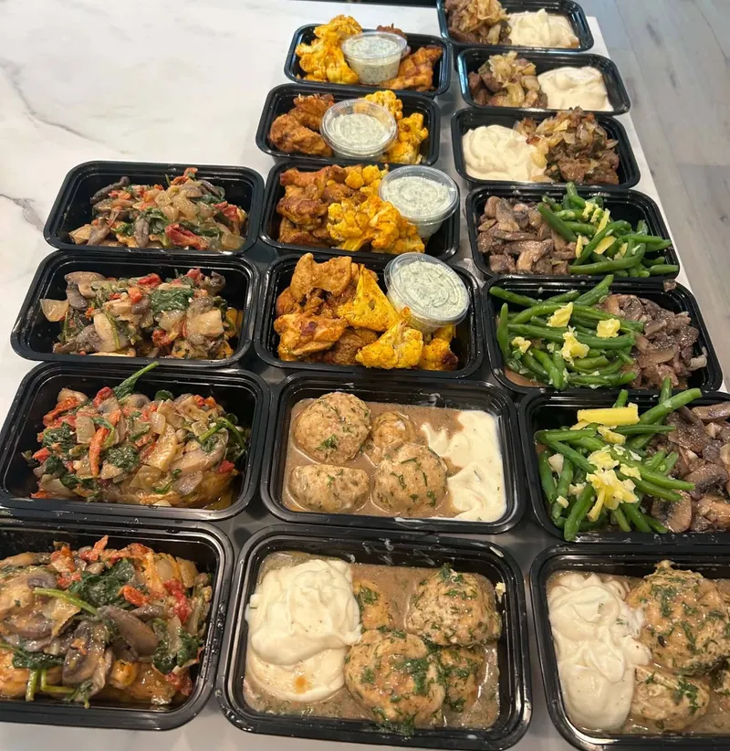 A week of Chef Teey meal prep containers, ready to heat and serve